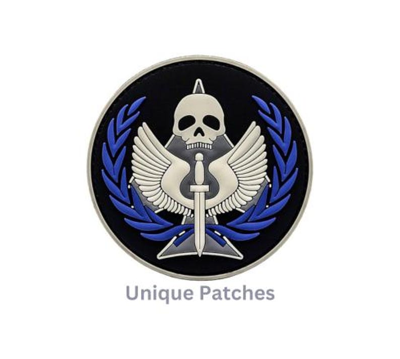 May include: A black and white embroidered patch with a skull and wings, a dagger, and a blue laurel wreath. The patch has the text "Unique Patches" below it.