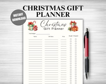 Peut inclure: Un planificateur de cadeaux de Noël avec le texte "CHRISTMAS GIFT PLANNER" et "Christmas Gift Planner". Le planificateur comprend des sections pour le budget, les idées cadeaux et le prix. Un stylo rouge et noir repose sur le côté droit.