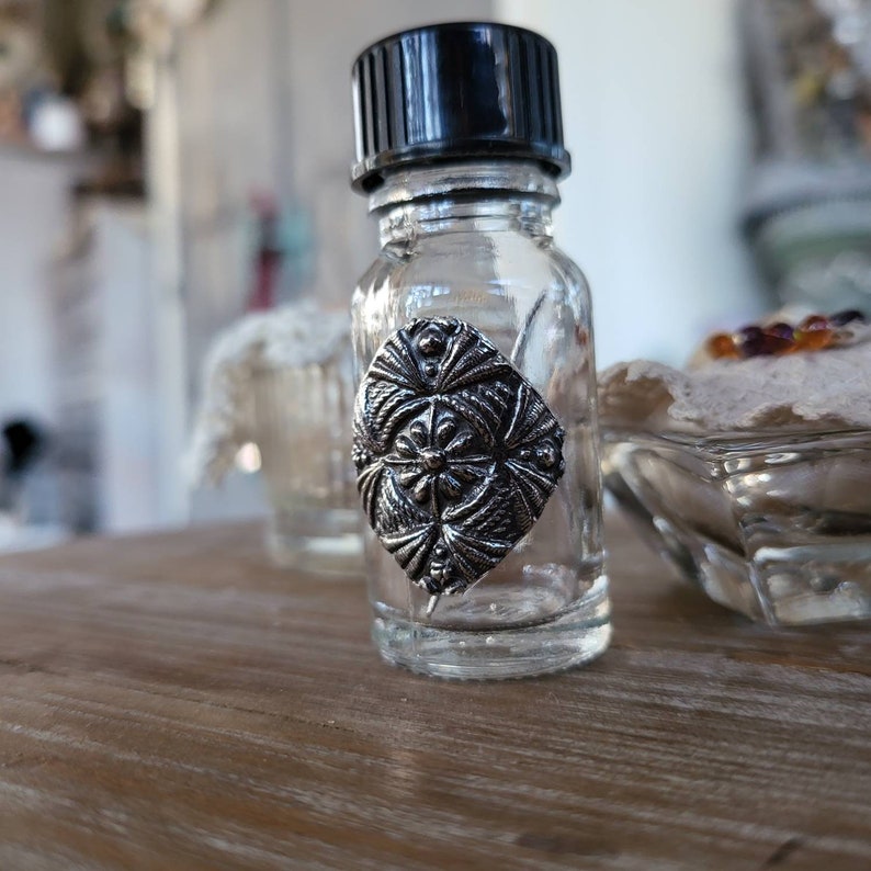 reclaimed fine silver charm on glass needle bottle, stitched diamond corner tie downs effect image 1