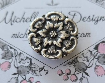 reclaimed fine silver rare earth magnet - encircled blossom - needleminder