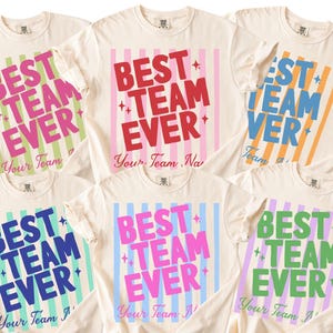 Six t-shirts in a grid, each with "BEST TEAM EVER" and colorful stripes.