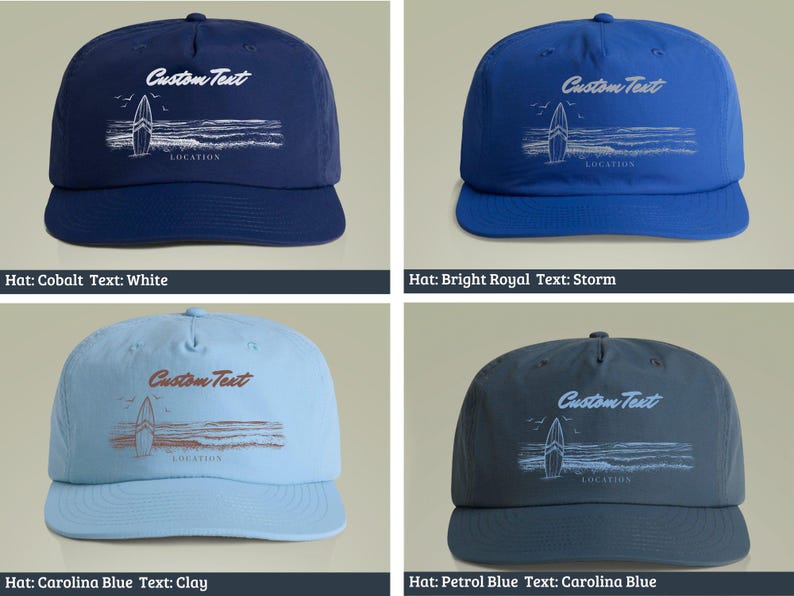 May include: Four different colored baseball caps with a white surfboard graphic and the text "Custom Text" in white. The caps are cobalt blue, bright royal blue, carolina blue, and petrol blue.