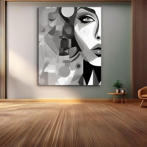 Puede incluir: Impresión de arte abstracto en blanco y negro con el rostro de una mujer con formas y patrones geométricos.