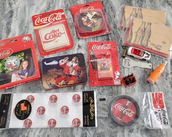 Lot of 13 Miscellaneous Vintage Coca Cola Memorabilia Coasters, Bottle Opener, Tissue Paper, Matchbox Car, Cards, & more