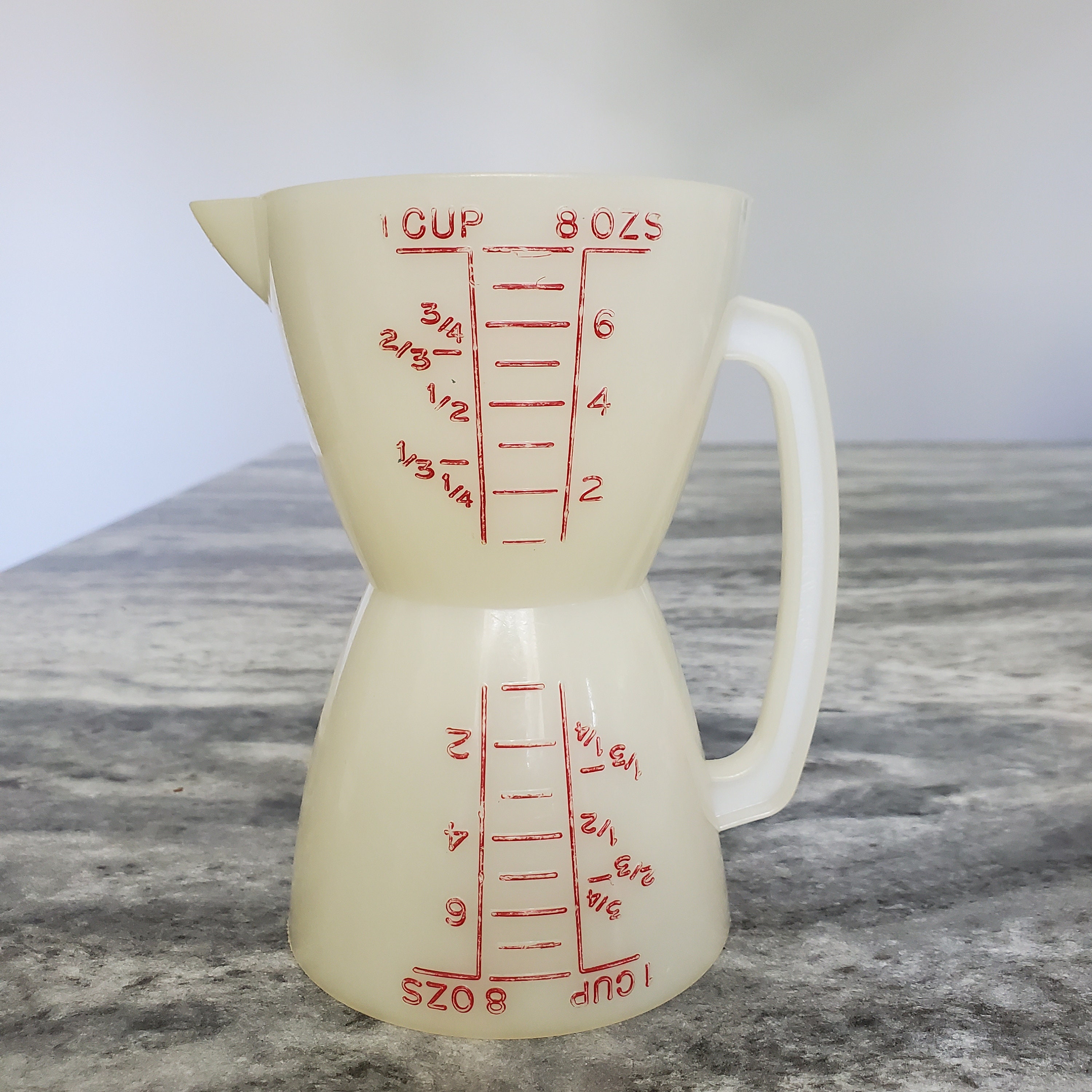 Uni-Coat Measuring Cup & Lid