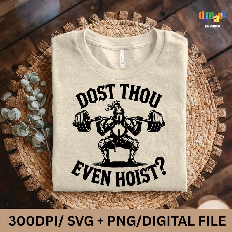 May include: Beige t-shirt with the text "DOST THOU EVEN HOIST?" and a graphic of a knight lifting weights. The design is in black and white. The shirt is displayed on a woven, circular mat.
