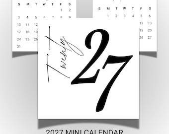 May include: A 2027 mini calendar set featuring a white square cover with the text Twenty 27 in black script and bold font. Two calendar pages for January and March 2027 are visible, displaying black text on a white background. The set is 3x3 inches.