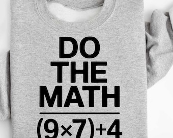 May include: A light gray sweatshirt with the text "DO THE MATH" in bold black letters. Below the text is the equation (9x7)+4. The sweatshirt is a casual style.