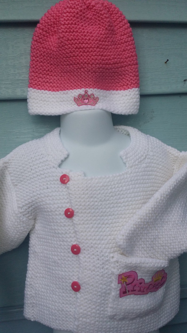 size 2T with pocket and Princess applique Hand knitted pink and white Garter stitch cardigan and hat set