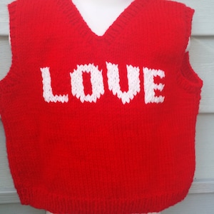 Hand Knit Child Red Sweater vest word LOVE knitted in white, size 2T,