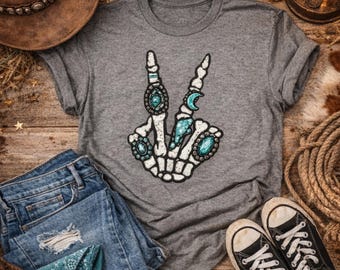 Camiseta unisex con estampado de conchos y anillos de esqueleto estilo western – Corte unisex, serigrafiada