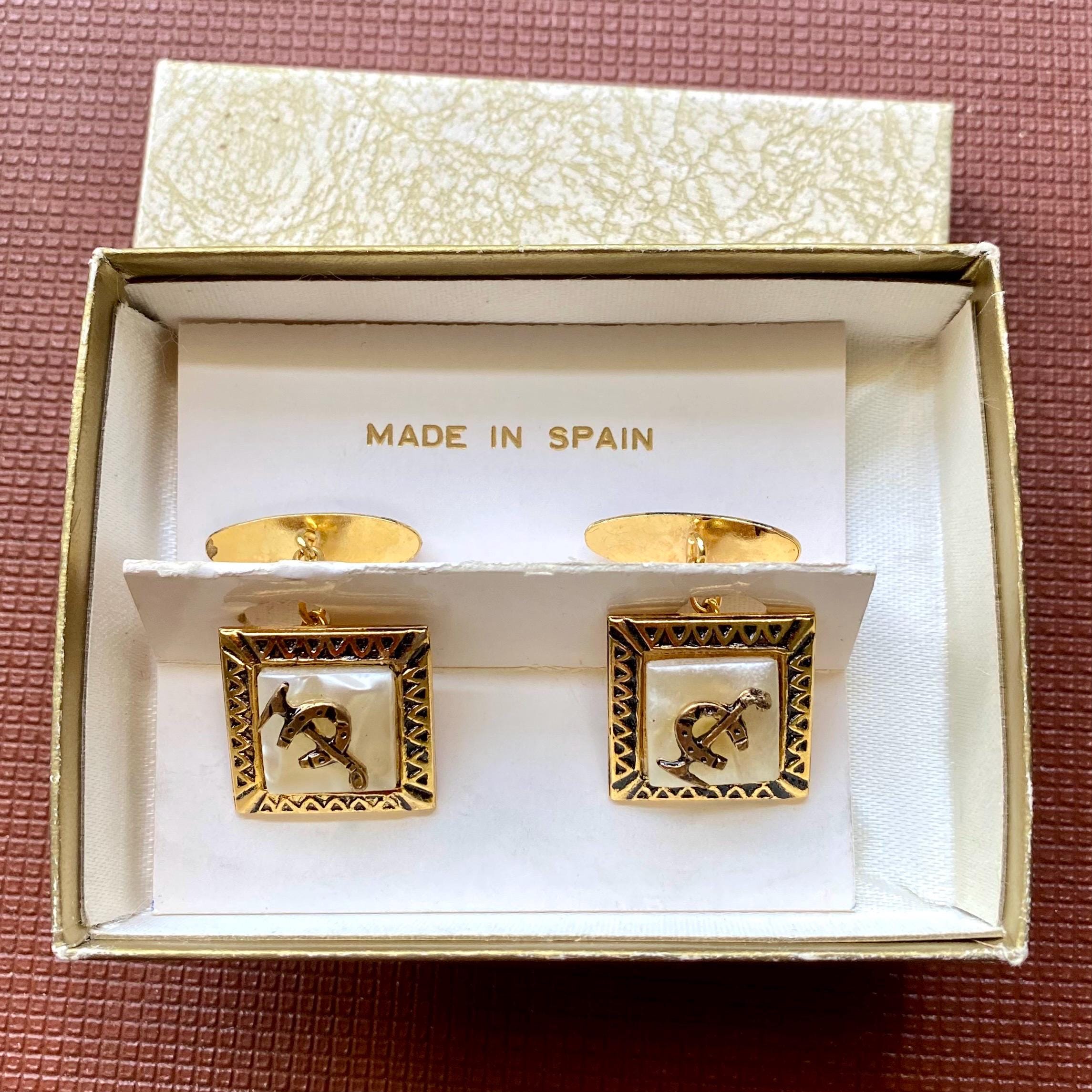 Boutons de mnchette figurtifs en or june vec fer à chevl en forme