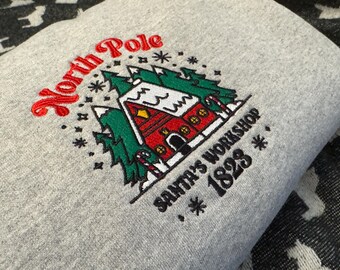Embroidered North Pole Santa's Workshop Sweatshirt, Vintage Christmas Shirt