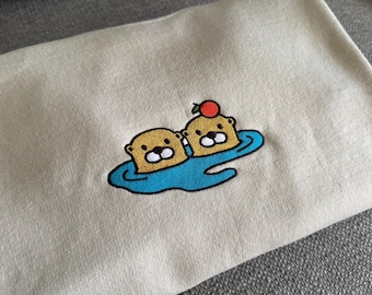 Sudadera con cuello redondo y diseño de nutria bordada, adorable sudadera con capucha con estampado de nutrias en el agua, regalos para amantes de los animales, regalo para ella para amantes de las nutrias kawaii