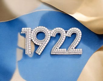 Broche met parel en strassteen uit 1922