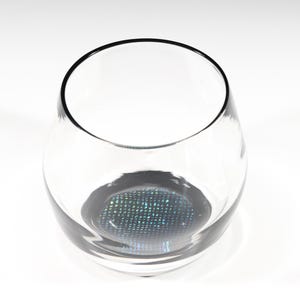 DRINKING VESSEL #6 Stemless wine glass with dichroic bottom.