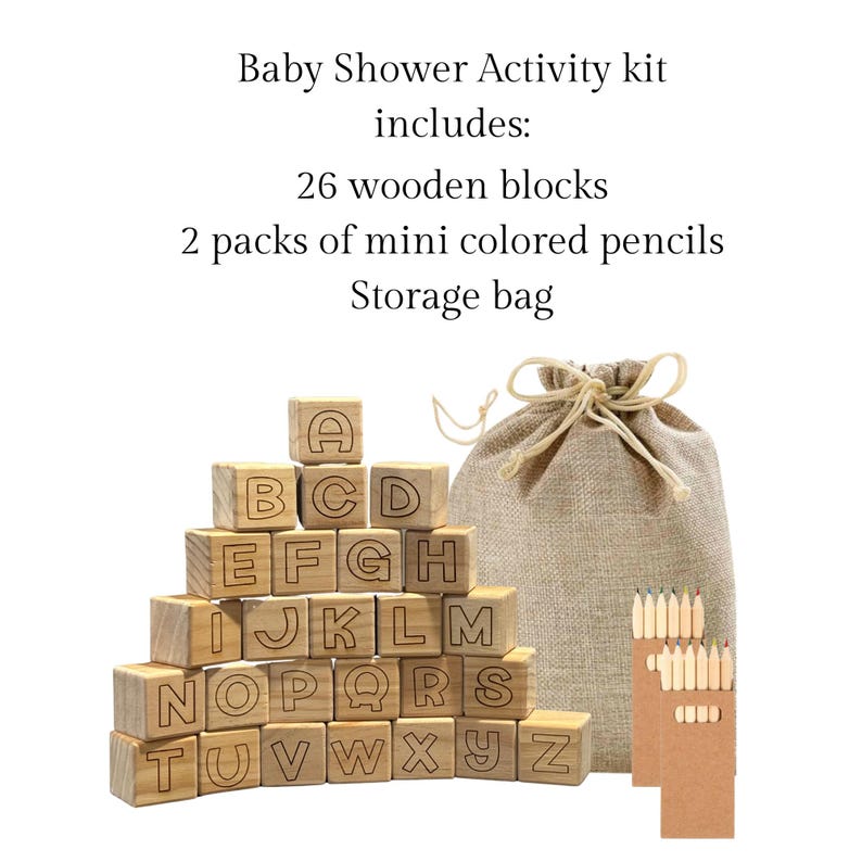 May include: A baby shower activity kit containing 26 wooden blocks, 2 packs of mini coloured pencils, and a storage bag. The blocks are arranged in a pyramid shape and spell out the alphabet. The pencils are in a brown cardboard box. The storage bag is made of burlap and has a drawstring.