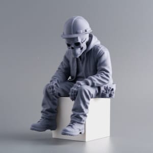 May include: A monochromatic grey resin figurine of a skeleton wearing a hard hat, a hooded jacket, and work trousers. The skeleton is seated on a white cube, with a tool belt attached to the waist, featuring visible tools tucked into the side pockets.