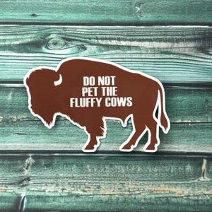 Do Not Pet The Fluffy Cows Weatherproof Sticker