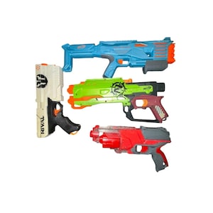 May include: A collection of four toy blasters including a blue rifle-style blaster, a green and maroon pistol-style blaster with the text NERF, a white and black pistol-style blaster labeled RIVAL, and a red and gray pistol-style blaster.