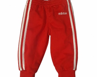 Pantalones deportivos Adidas para bebé, estilo retro, 6 meses, color rojo y blanco.