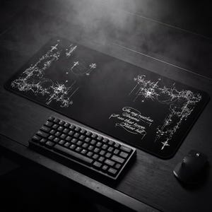 May include: A trio of ceramic mugs with a speckled, matte finish in cream, light grey, and dark grey. Each mug features a minimalist design and a rounded handle. Ideal for tea or coffee.