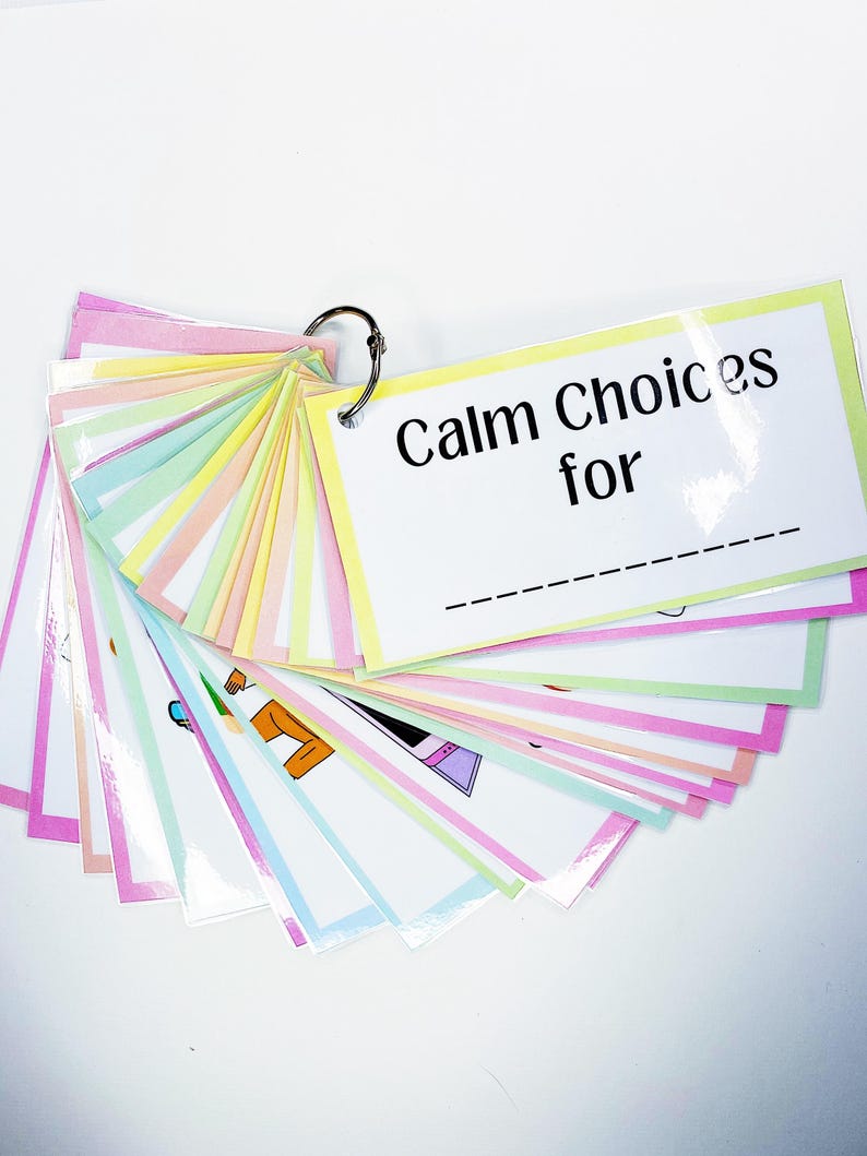 May include: A set of colourful cards with images and the text "Calm Choices for" on the top card. The cards are attached together with a metal ring.
