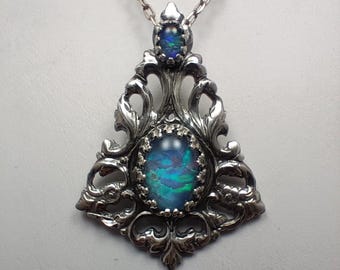 Weather the Storm Pendant - Spencer opal, Idaho opal, sterling silver floral setting