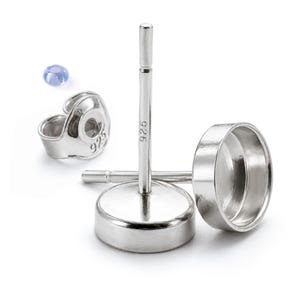 May include: A pair of sterling silver stud earring settings with a circular bezel cup for stone setting. The earring posts are clearly stamped with 925, and the matching silver earring backs also feature the 925 hallmark for authenticity.