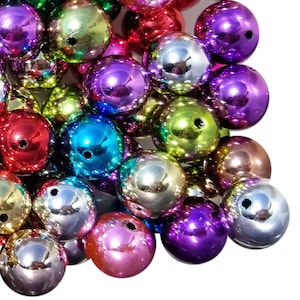 May include: A collection of colorful, metallic, round beads. The beads are various shades of red, green, blue, purple, silver, and gold.