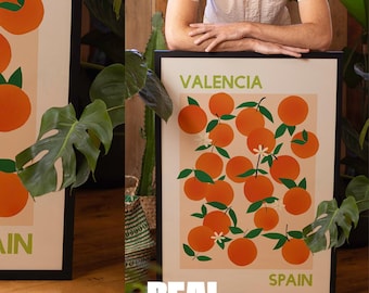 May include: A framed poster with a peach background and a graphic design of oranges with green leaves and white flowers. The poster says "Valencia, Spain" and "REAL Art Mockups" at the bottom.