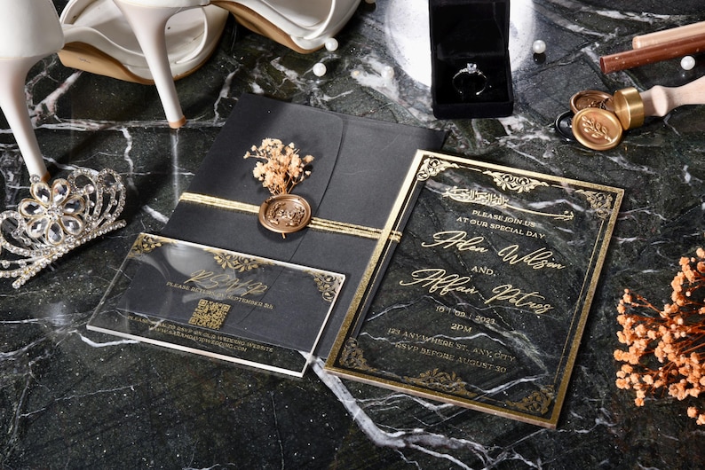 May include: A black and gold wedding invitation with a marble design. The invitation features the names "Alen Wilson" and "Allan Plus" with the date "10th Dec. 2021".