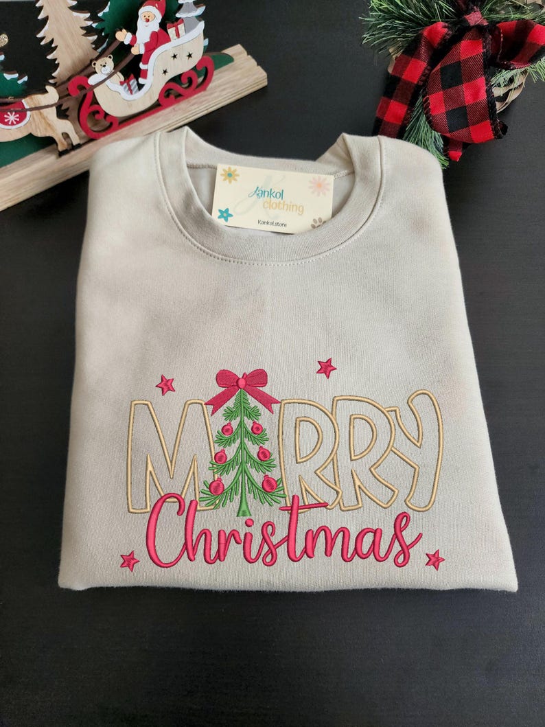 Holiday Fashion Sweatshirt Christmas Embroidered Design Festive Tree Detail Winter Apparel Casual Outfit Soft Cotton Blend Comfortable Fit Seasonal Clothing Multiple Color Options Size Range Available Christmas Party Wear Celebration Outfit