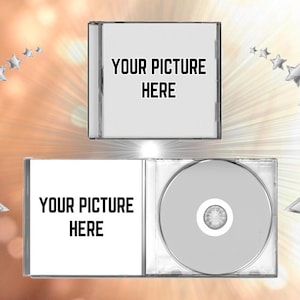 May include: A blank CD case with a clear plastic disc inside. The case has a white background with the text "YOUR PICTURE HERE" printed on the front and back.