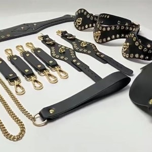 Leder Bondage Kit - Fesselset mit Leder Handschellen, Fußfesseln, Halsband & Leine, Paddel, Augenbinde