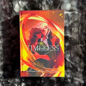 May include: A book cover with a red, orange and yellow background. The cover features a couple embracing, with the text "TIMELESS" in a stylised font. The author's name, "alexandra emerson", is printed below the title.