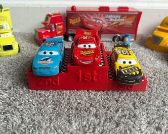 Podio de coches de carreras de metal fundido - Disney Pixar Cars - Hot Wheels