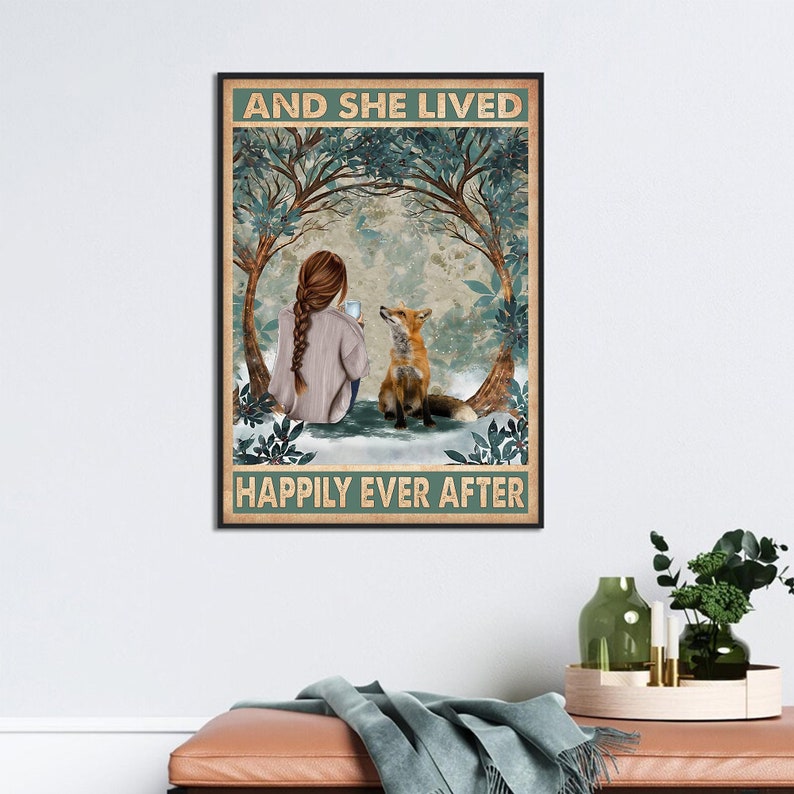 May include: A vintage-style poster with a woman sitting in a snowy forest with a fox. The text reads "And she lived happily ever after."