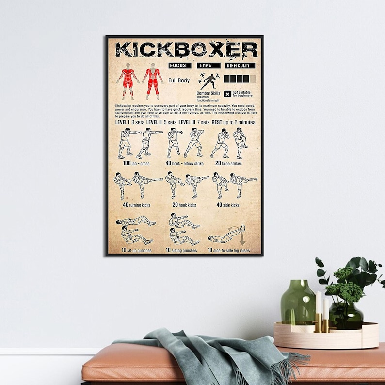 May include: A vintage-style poster with a black frame, titled "Kickboxer". The poster features a workout routine for kickboxing, with illustrations of different exercises and the number of repetitions for each. The poster is on a beige background with a brown border.