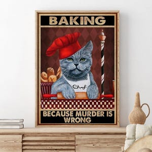 May include: A framed poster with a grey cat in a chef's hat and apron, holding a rolling pin. The poster reads "BAKING" at the top and "BECAUSE MURDER IS WRONG" at the bottom. The cat is positioned in front of a basket of bread.