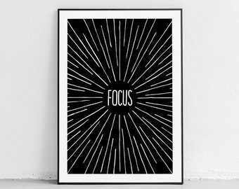 Op de afbeelding: Zwart-witte printbare kunstprint met een zonnestralenontwerp en het woord "FOCUS" in het midden.