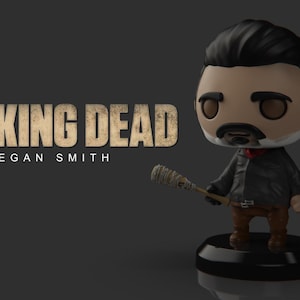 May include: A stylized figure of Negan Smith from "The Walking Dead" series. The figure has a black jacket, brown pants, and a baseball bat. The figure is on a black base, with the show's logo in the background.