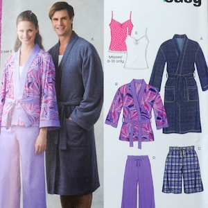May include: A sewing pattern showing a man and woman in sleepwear and robes. The pattern includes a purple and pink floral print robe and trousers, a blue robe, and a pink polka dot camisole. The pattern is for Misses' sizes 8-18.