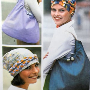 May include: Two women are wearing colorful headbands. One headband is striped and the other has a floral pattern. Both women are carrying large tote bags. The bag on the left is purple and the bag on the right is blue.