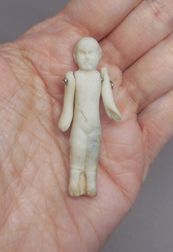 tiny antique porcelain dolls