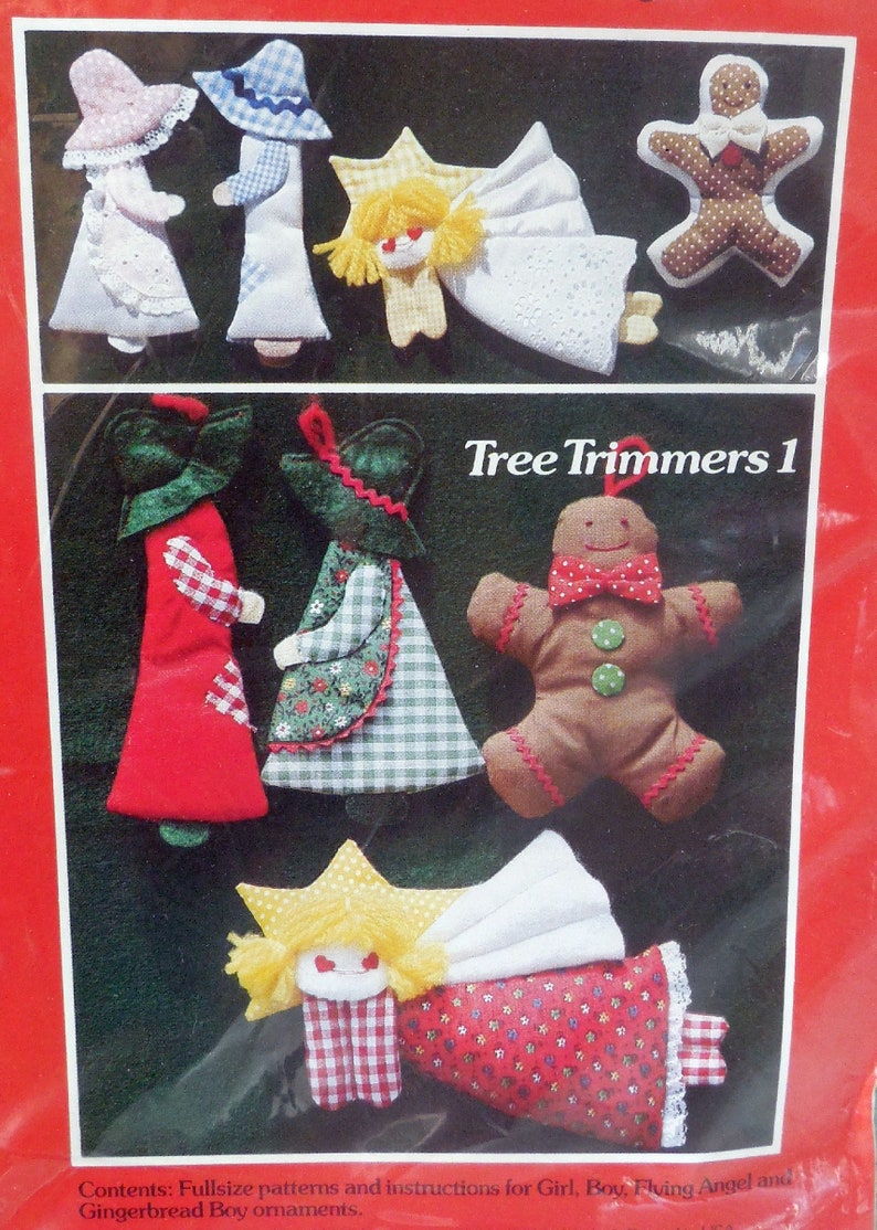 May include: A collection of handmade Christmas tree ornaments. The image features various fabric ornaments, including angels, gingerbread people, and figures in dresses and hats. The text "Tree Trimmers 1" is visible.
