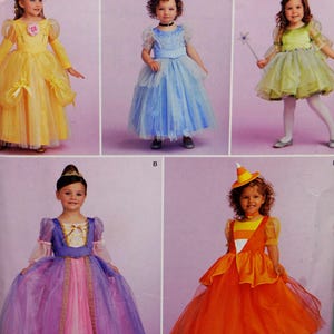 May include: A sewing pattern for five different princess costumes for children. The costumes include Belle, Cinderella, Tinkerbell, Rapunzel, and a candy corn costume.