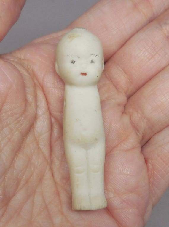 tiny antique porcelain dolls