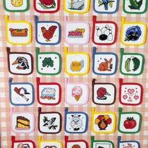 May include: A set of 36 colorful pot holders with various embroidered designs, including a pear, a rose, a golf club, a bird, peas, a hot dog, a rooster, a pie, bowling pins, a flower, a duck, a shamrock, a beer mug, a rabbit, green beans, a baseball bat, a peanut butter jar, an ice cream cone, a bird, a heart, a cake, a bird, a sheep, a turkey, a tomato, Santa Claus, a pretzel, a basketball, a football, and a pig.