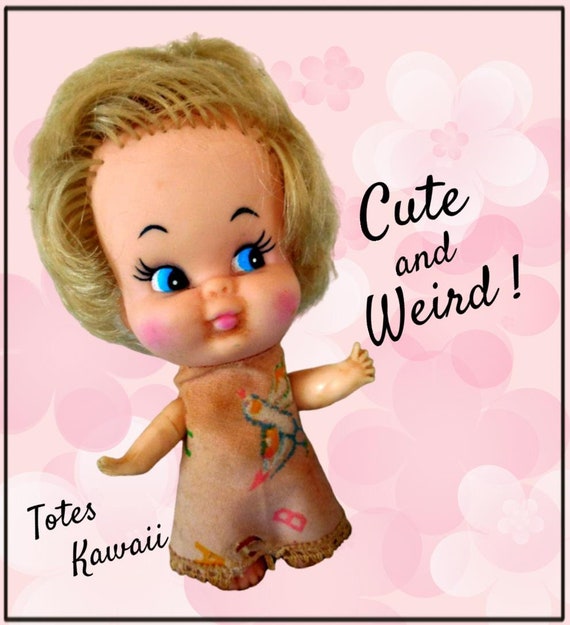 little dolls with big heads